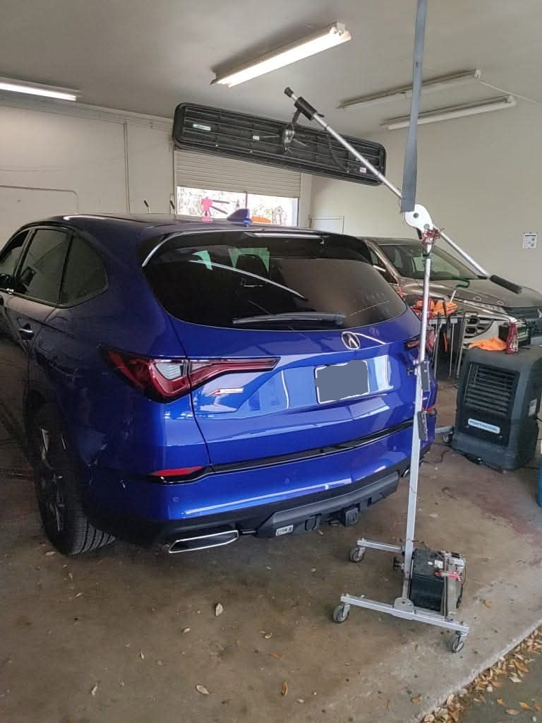 Roof hail dent removal example for Deltona-area customers